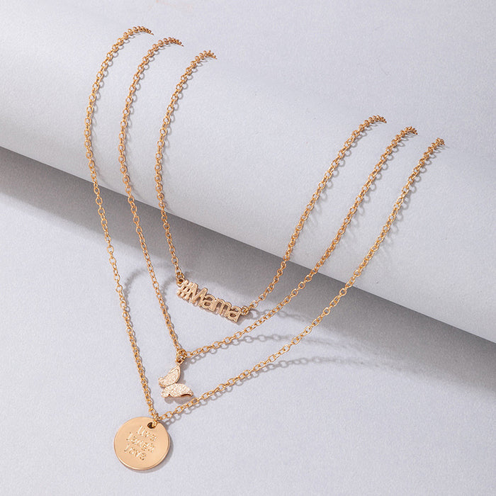 Triple Layered Snake Chain Necklace with Disc, Letter, and Butterfly Pendants - Fashionable Statement Piece