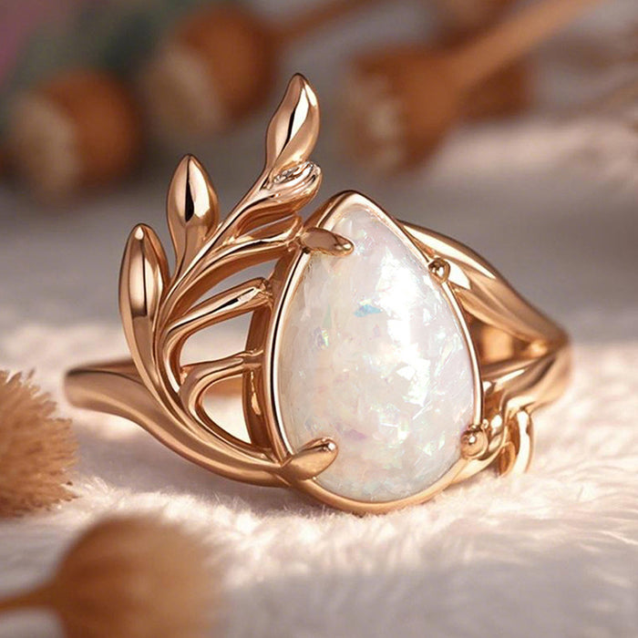 Women's Baroque ring with water drop imitation opal leaf and branch
