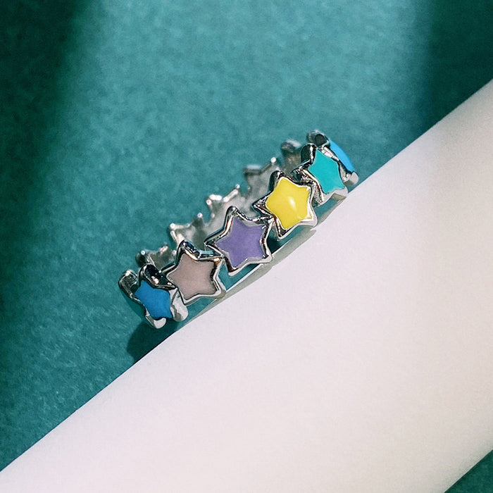 Anillo de estrella colorido que gotea aceite, exquisito y encantador anillo femenino de estrella de cinco puntas de círculo completo