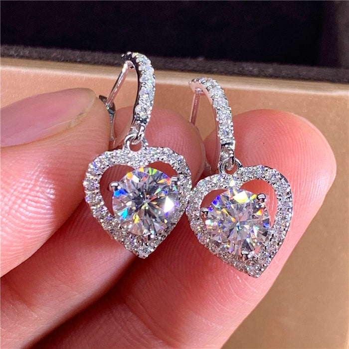 Hollow heart-shaped zircon earrings