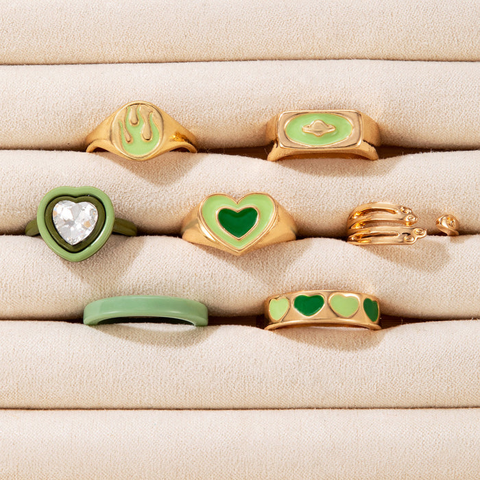 Juego de anillos de palma con forma de llama de amor y goteo de aceite verde, conjunto de siete piezas con forma de corazón de resina geométrica