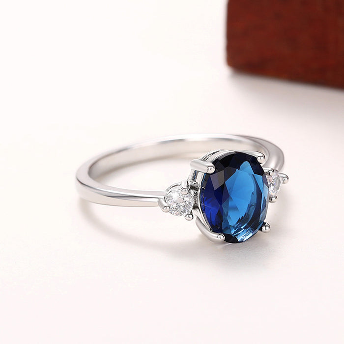 Anillo de piedra preciosa azul con forma de huevo con incrustaciones, joyería de temperamento noble