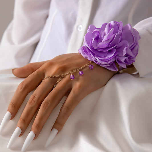 Elegante cadena de mano francesa con flor morada: anillo con borlas de cuentas para mujer, joyería transfronteriza