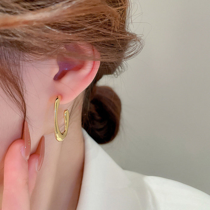Gold geometric earrings Metallic cool style hoop earrings