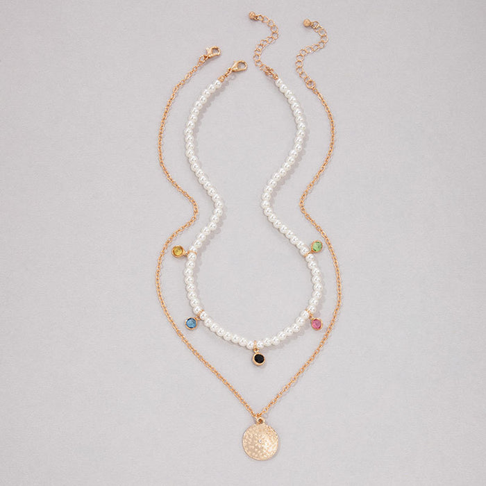 Layered Coin Pendant Necklace with Pearl Accents - Chic and Elegant Design