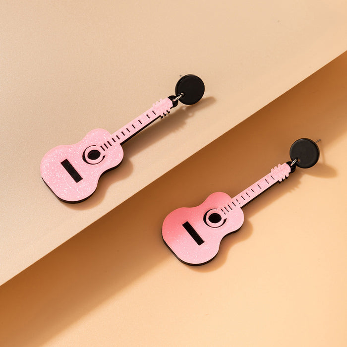 Pendientes de guitarra con purpurina de resina rosa, pendientes geométricos irregulares