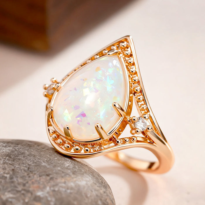 Women's teardrop multi-claw inlaid imitation opal ring