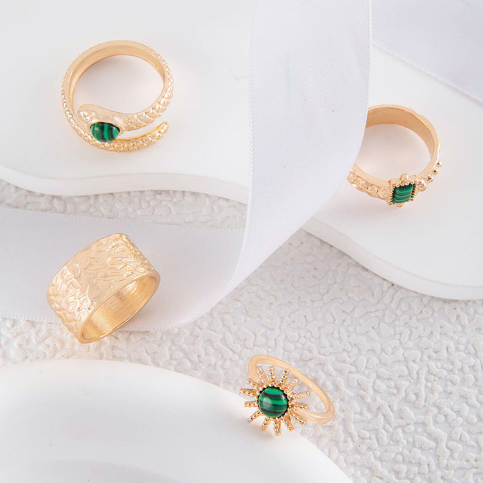 Green pattern snake-shaped diamond sunflower eyes four-piece ring set