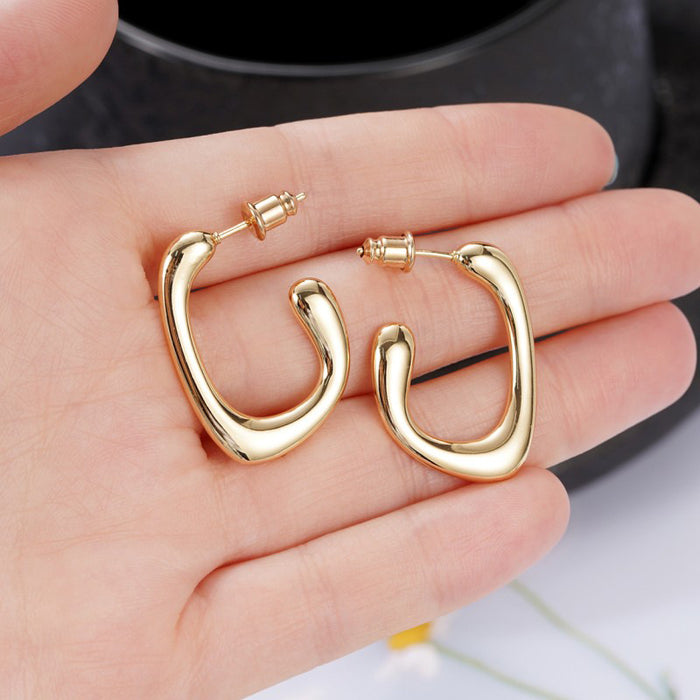 Gold geometric earrings Metallic cool style hoop earrings