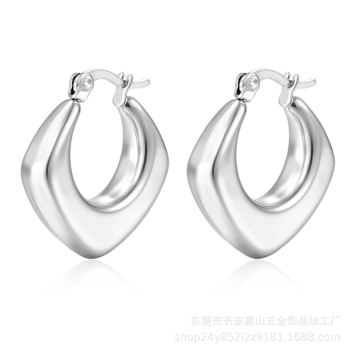 Stainless steel women's round real gold 18K oval light luxury hollow earrings