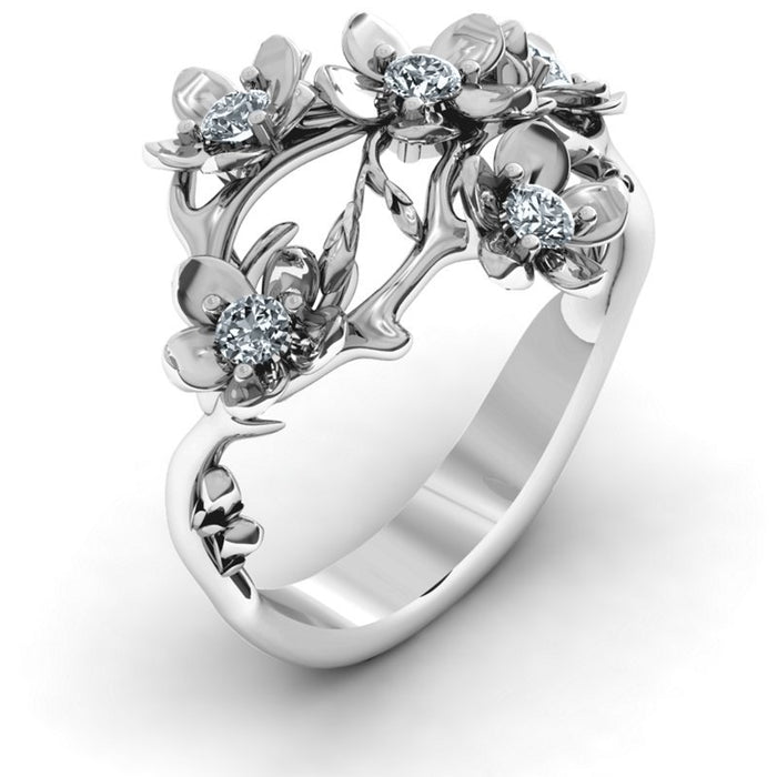 Anillo de circonita floral retro para mujer, joyería de mano versátil y sencilla.