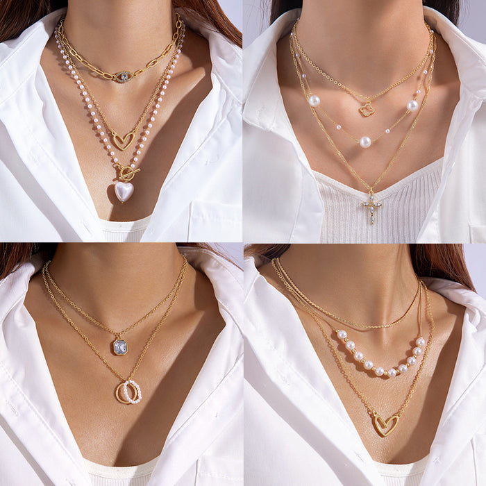 Multi-Layered Pearl and Heart Pendant Necklace