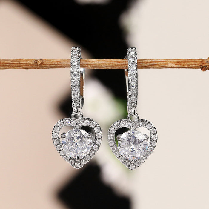 Hollow heart-shaped zircon earrings