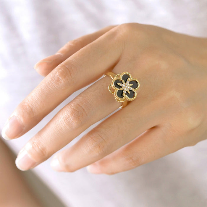 Wholesale black eight-pointed star five-petal flower rotating open ring