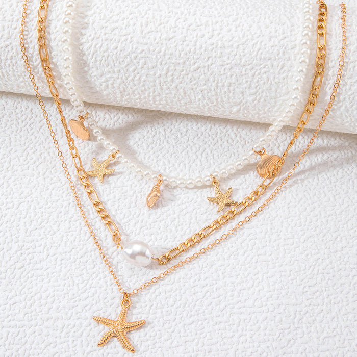 Layered Beach Necklace with Faux Pearls, Starfish, and Shell Charms - Retro Vacation Jewelry for Women