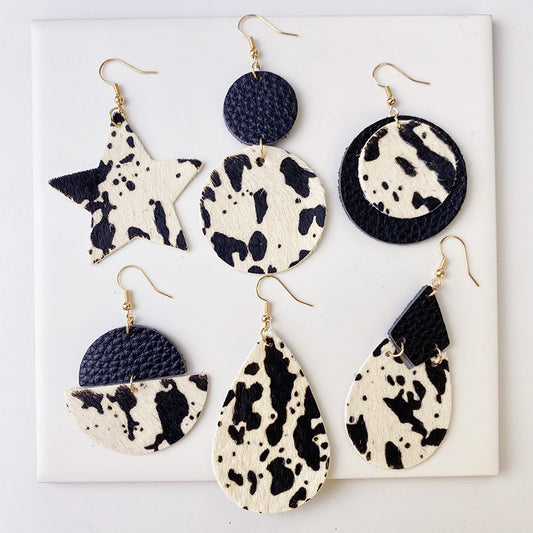 Cow Print Leather Earrings with Bullhead and Turquoise Design