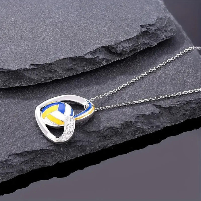 Collar deportivo con dije de voleibol en forma de corazón