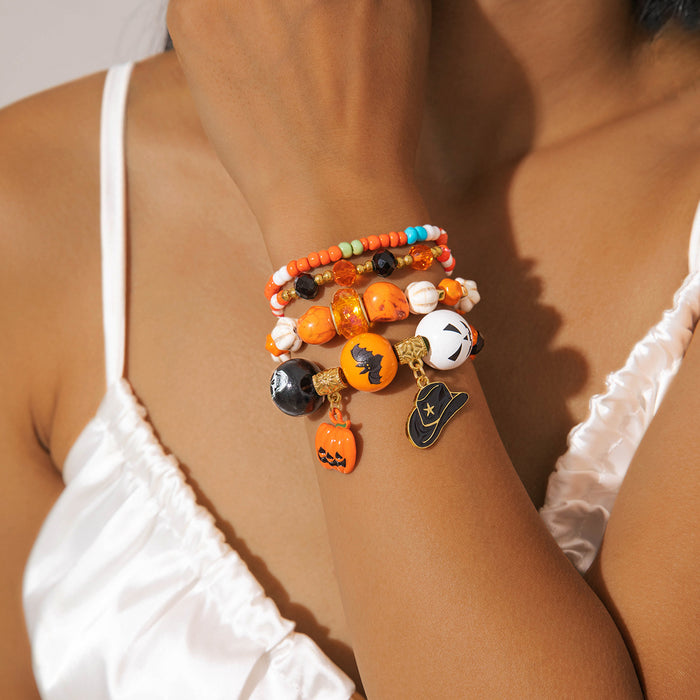 Juego de pulseras de cuentas con forma de calabaza y calavera para Halloween: accesorio único y divertido de cuatro piezas