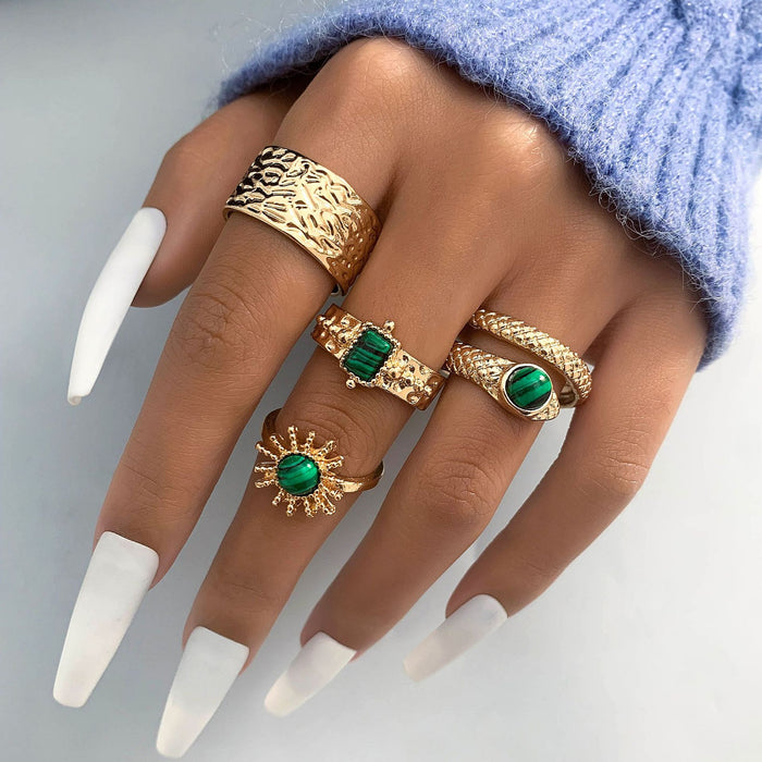 Green pattern snake-shaped diamond sunflower eyes four-piece ring set