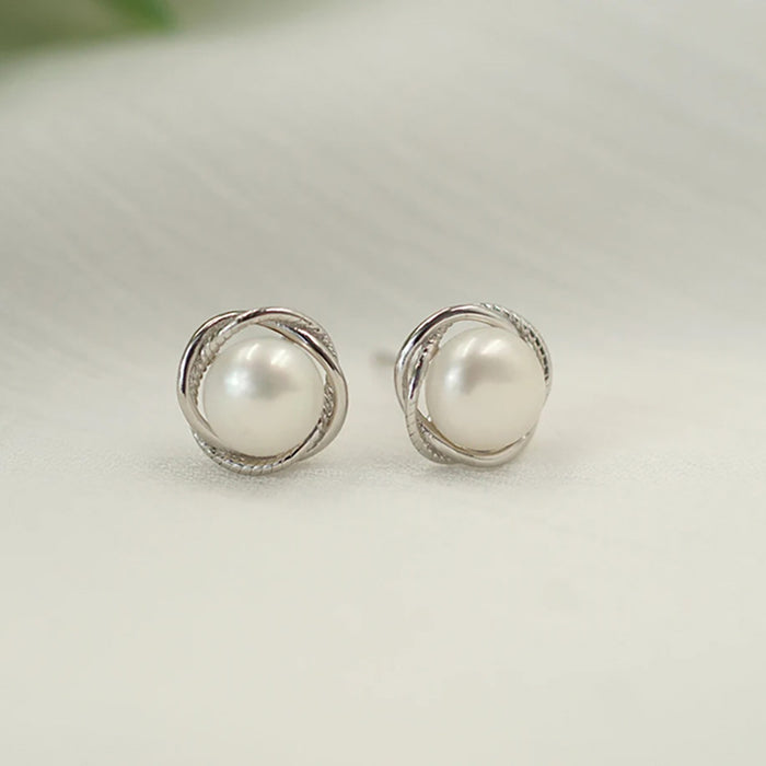 Imitation pearl earrings floral twist earrings