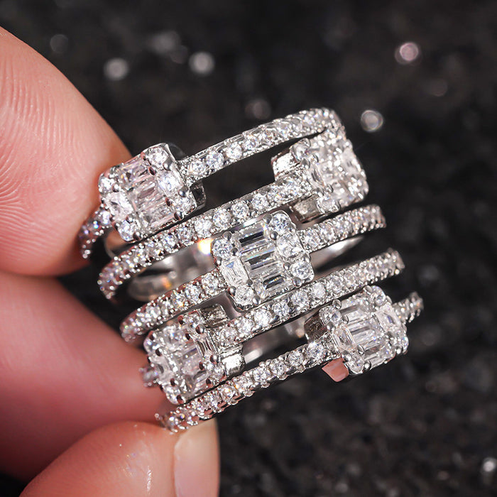 Women's multi-layered ring with micro-set half-circle diamonds