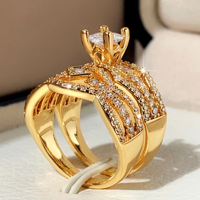 Anillo de compromiso con ocho corazones y ocho flechas de diamantes y circonitas engastadas en estilo europeo y americano.