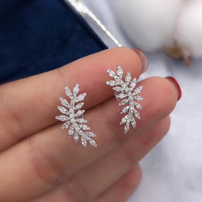 Pendientes vintage de plumas y flores
