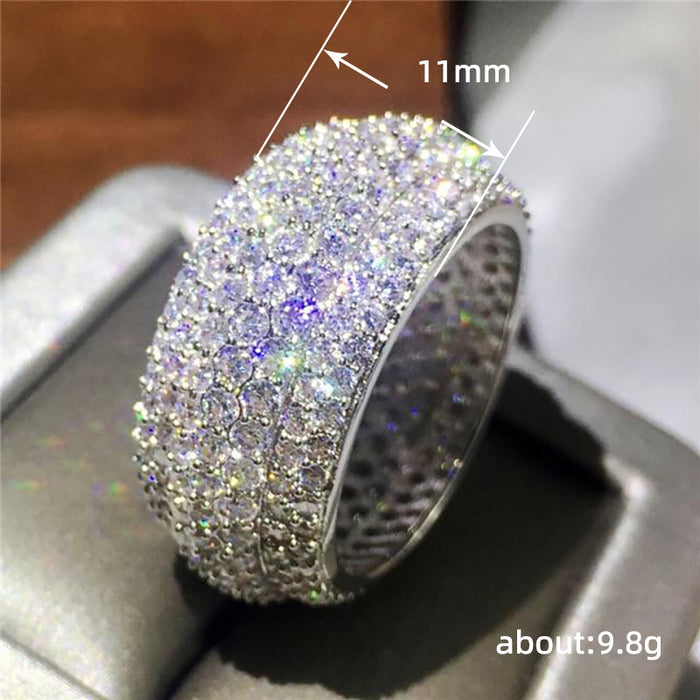 Anillo de propuesta con diseño de brazo torcido exquisito con diamantes de imitación de cuatro garras