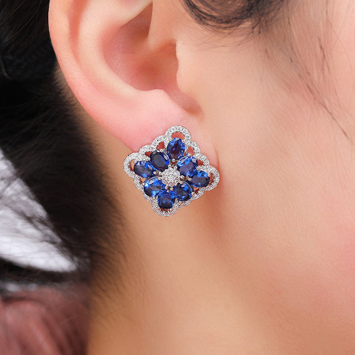 Blue enchantress flower earrings