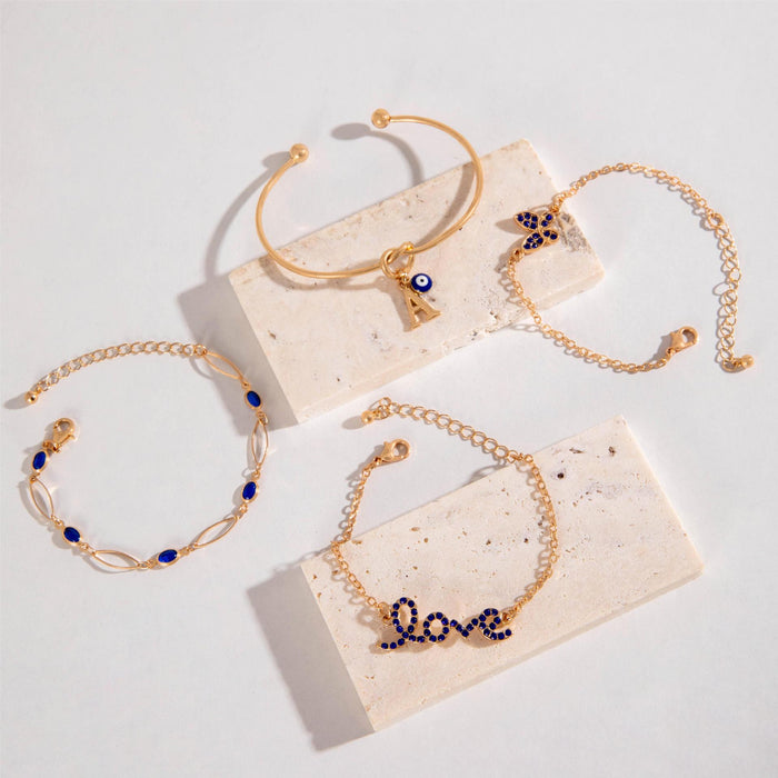 Conjunto de pulseras con letras de amor y ojo malvado con diamantes de imitación de zafiro de moda (cuatro piezas)