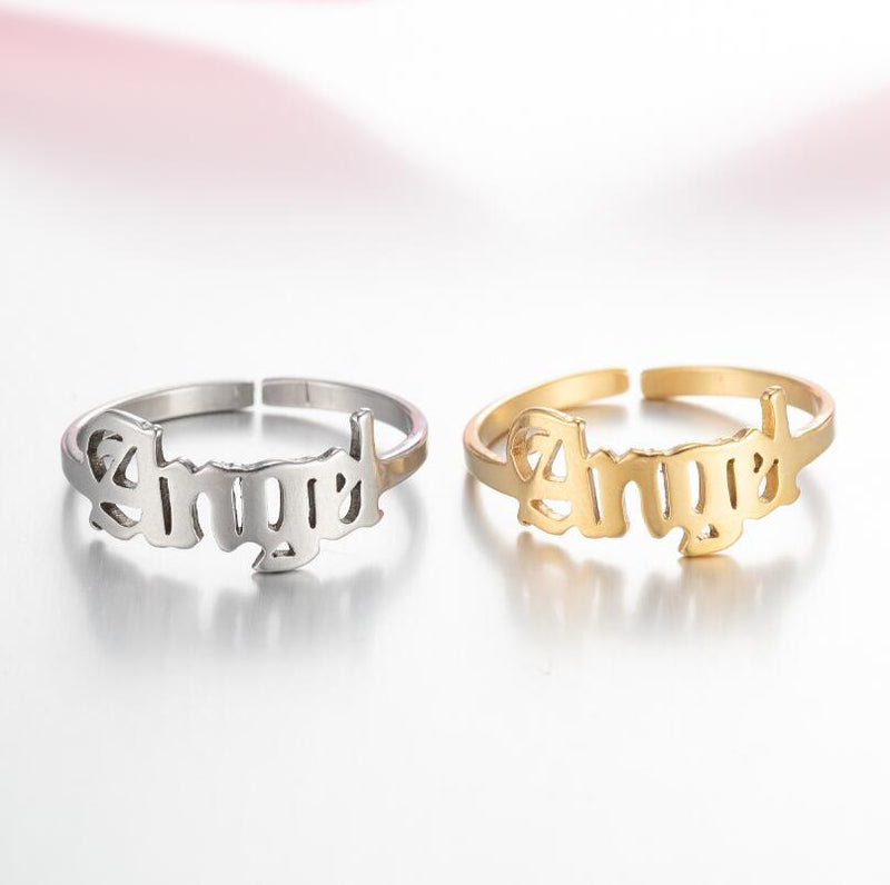 Anillo de acero inoxidable con letras de ángel simples japonesas y coreanas al por mayor