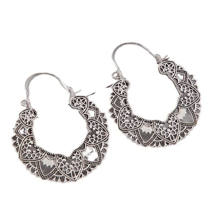 Retro ethnic style hollow flower earrings versatile carved earrings