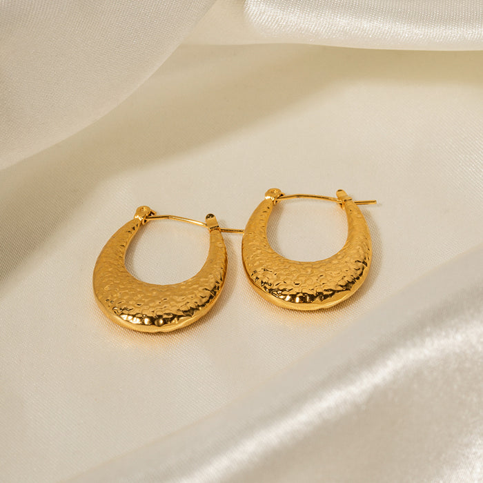 Aros de acero inoxidable chapados en oro de 18 quilates con textura de lava de estilo europeo: joyas de diseño exclusivo para mujeres