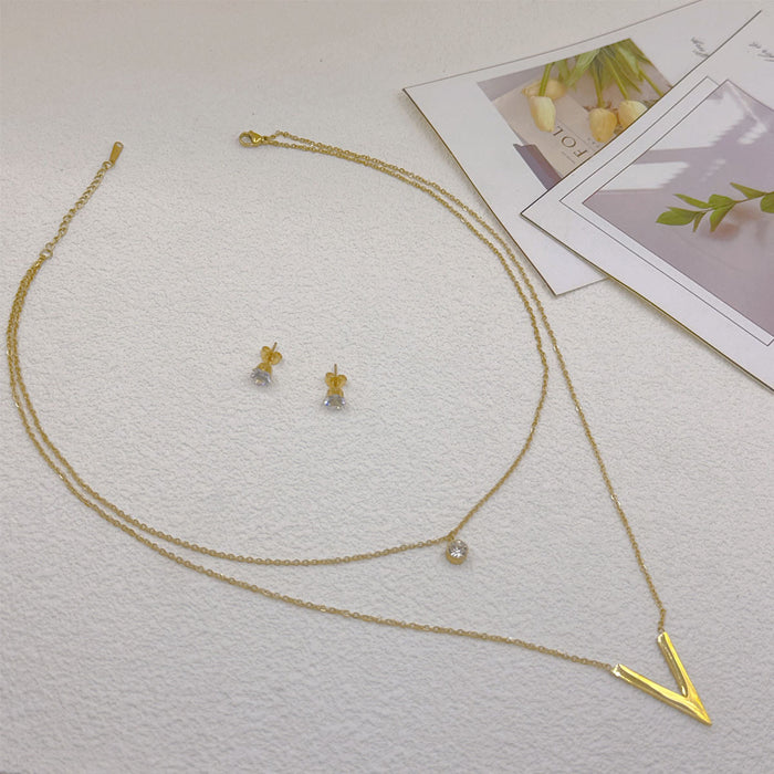 Aretes de acero inoxidable y titanio chapados en oro con forma de estrella al por mayor