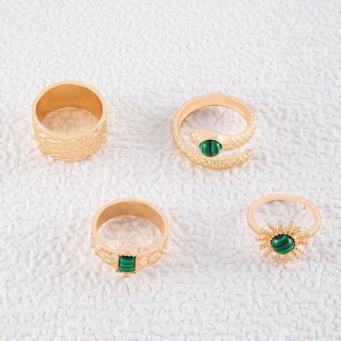 Green pattern snake-shaped diamond sunflower eyes four-piece ring set