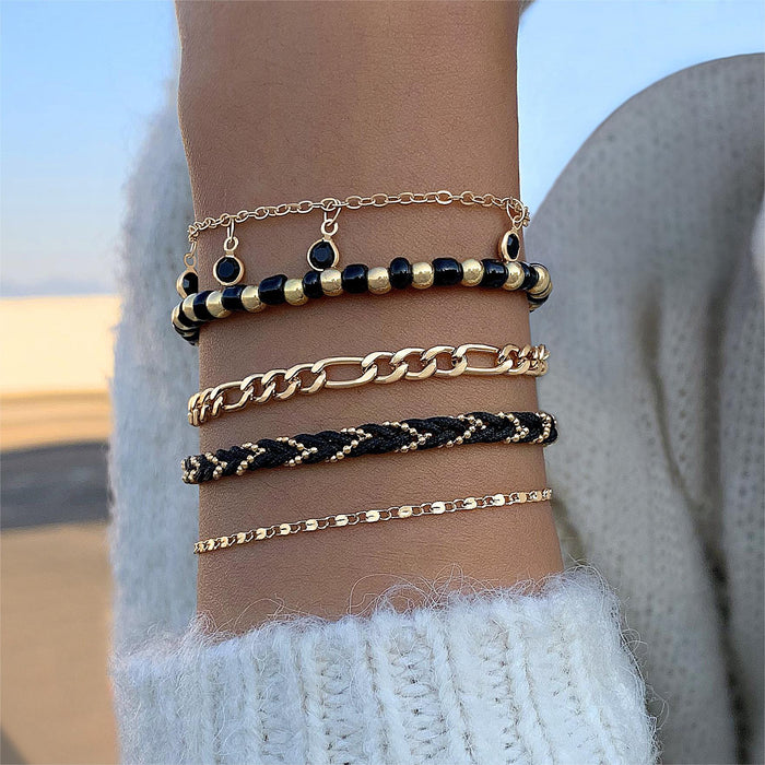 Conjunto de pulsera con colgante de trébol de cuatro hojas negro de estilo bohemio europeo: joyería con cadena de metal geométrica