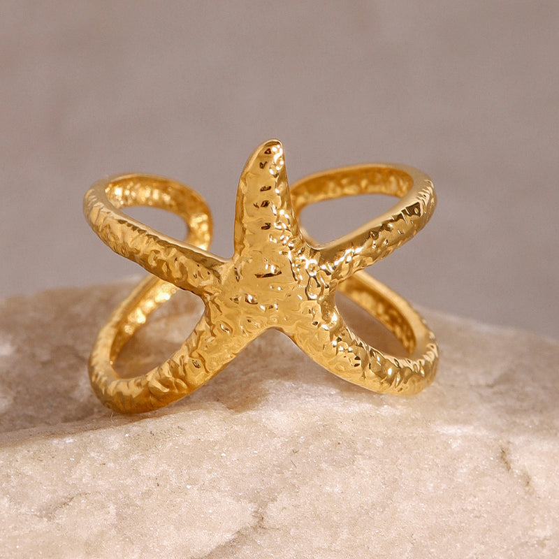 Anillo abierto de estrella de mar de acero inoxidable