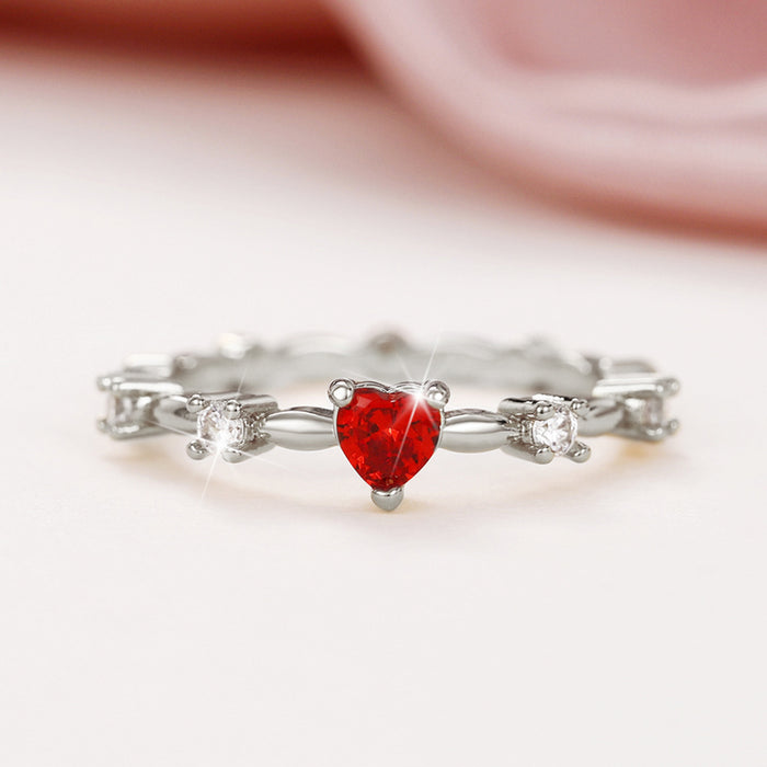 Red zircon heart-shaped index finger ring