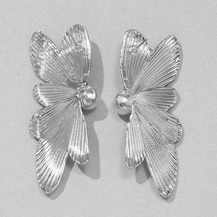 Pearl inlaid butterfly earrings geometric irregular alloy earrings