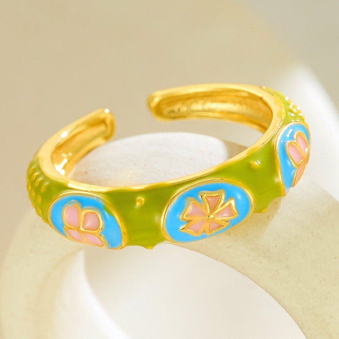 Wholesale dripping four-leaf clover open rings