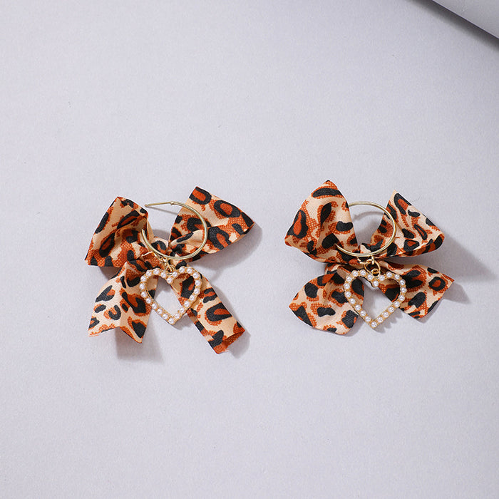 Pendientes de lazo con estampado de leopardo, pendientes de perlas versátiles