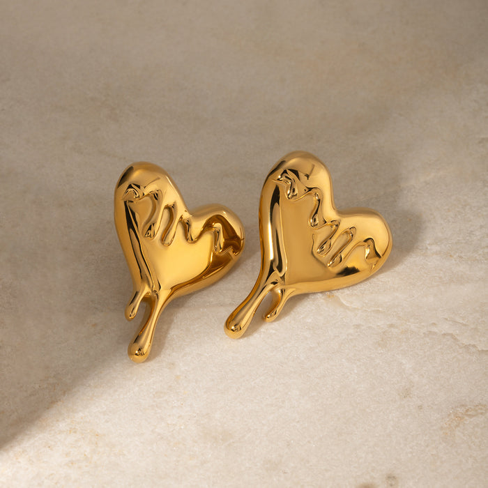 Pendientes de acero inoxidable con forma de corazón derretido y oro de 18 quilates de diseñador: joyería asimétrica con forma de corazón