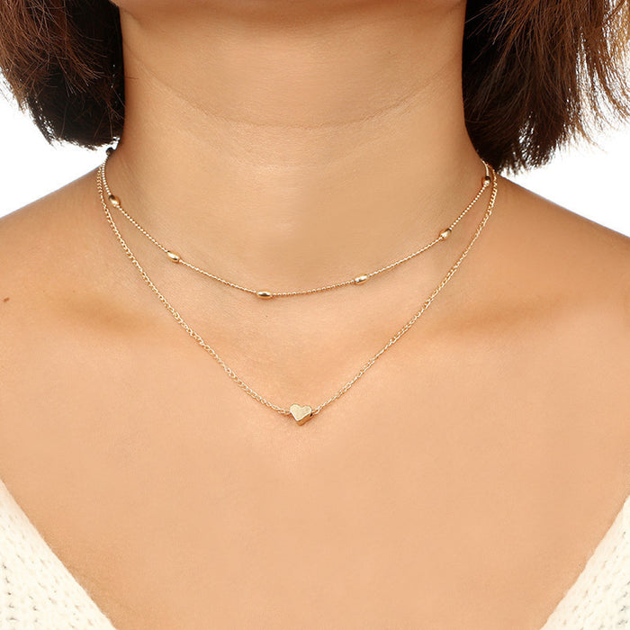 Collar geométrico multicapa para mujer: joyería minimalista con colgante circular