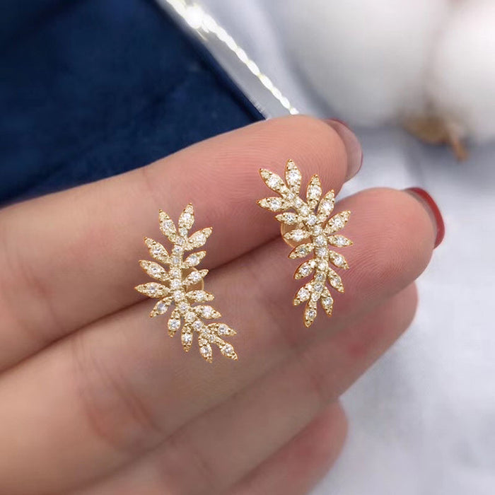 Pendientes vintage de plumas y flores