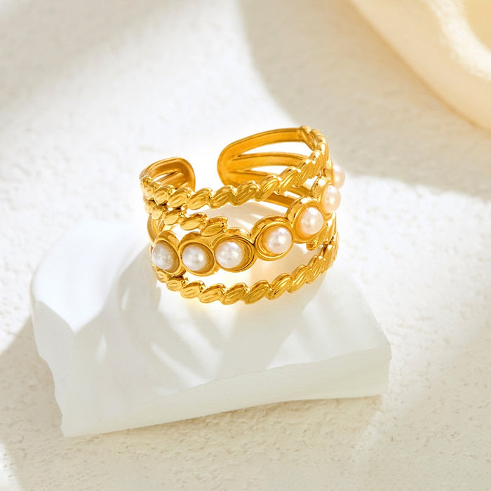 Wholesale stainless steel pearl-set geometric oval openwork ring