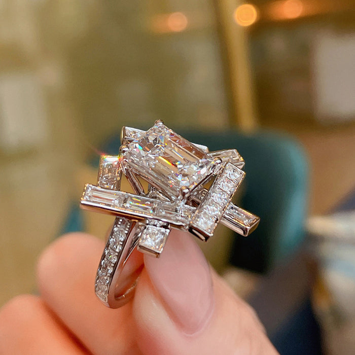 Interwoven rectangular ring ins geometric diamond ring high and low staggered design