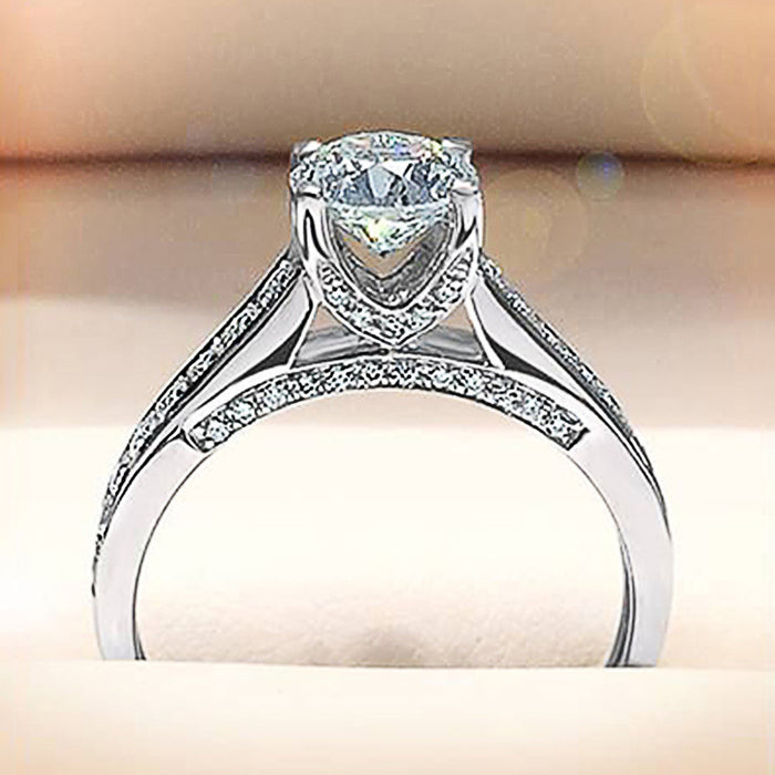 White gold plated zircon female ring, classic four-claw ring