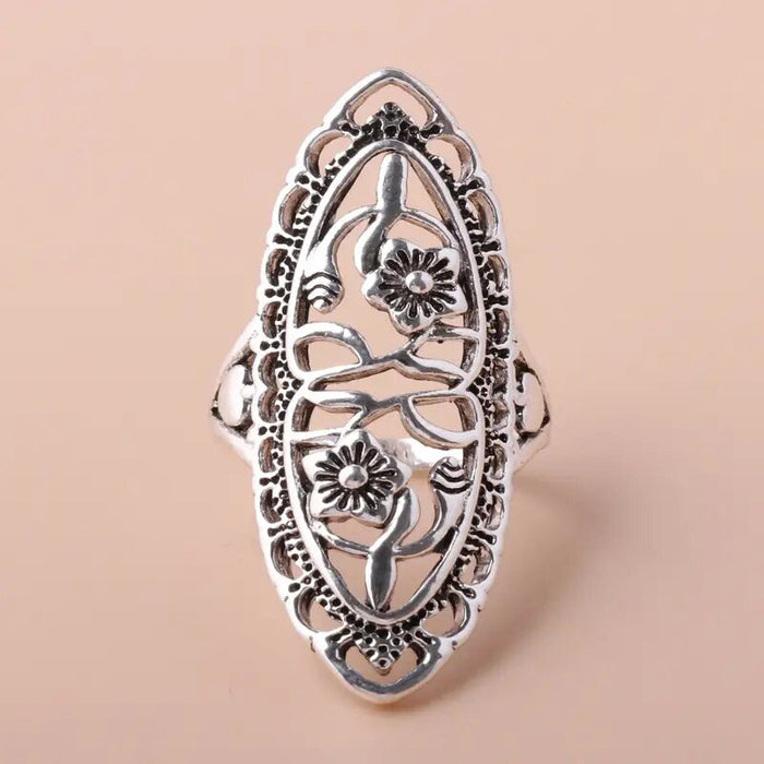 Patterned hollow flower ring alloy plum blossom fashion ring