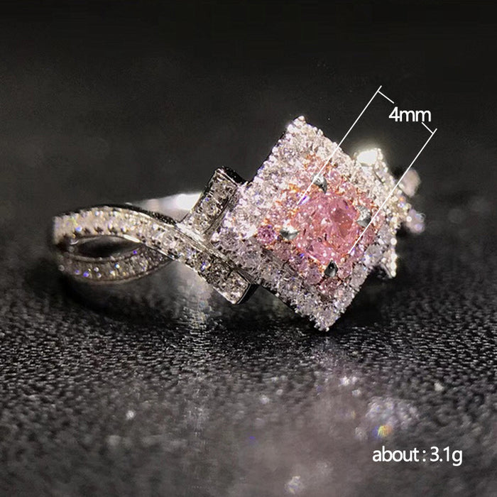 Anillo de diamantes rosas y circonitas en forma de cruz para mujer