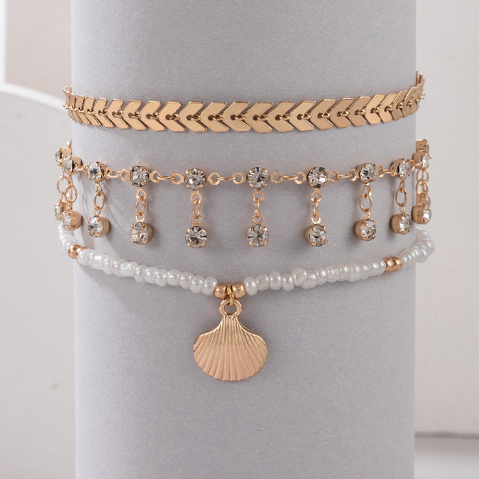 Crystal Tassel Anklet with Shell and Geometric Aircraft Charms